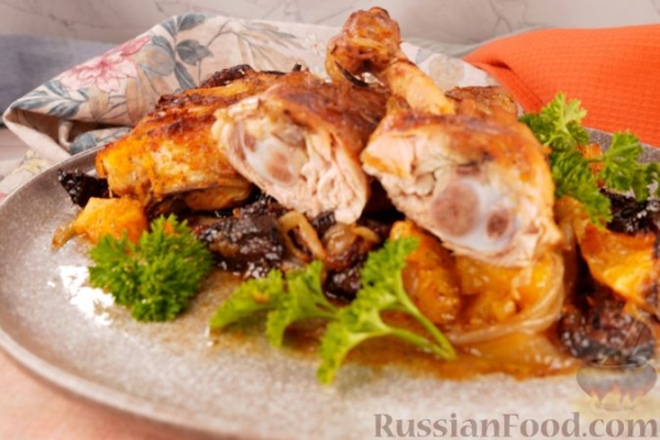 Куриные окорочка, запечённые с апельсином и черносливом