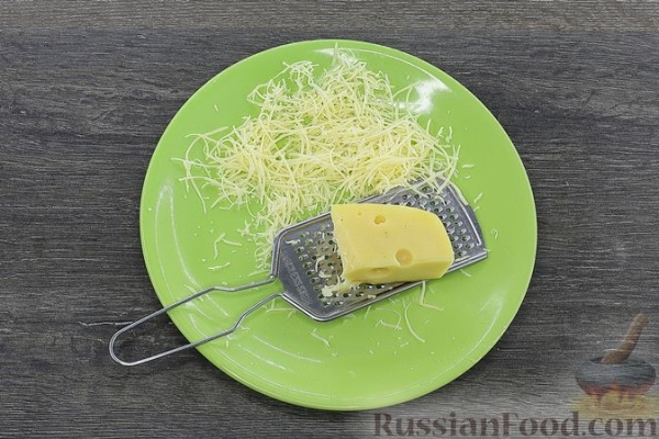 Куриные бёдра, запечённые с брюссельской капустой и помидорами