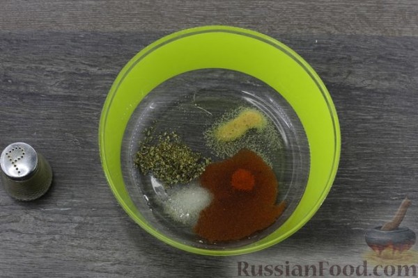 Отбивные из свинины, запечённые с грибами и помидорами