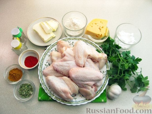Запечённые куриные крылышки с сыром и чесноком
