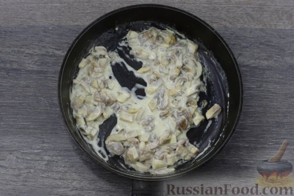Отбивные из свинины, запечённые с грибами и помидорами