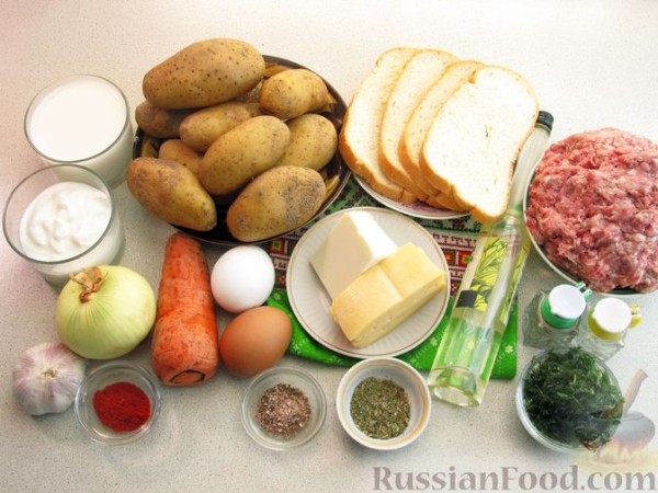 Котлеты, запечённые с картофелем в молочном соусе, с сыром