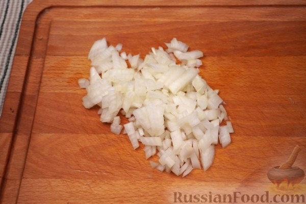 Рыбные котлеты, запечённые в сливочно-шпинатном соусе