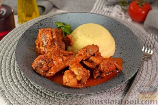Кокорас красатос (петух, тушенный в вине)