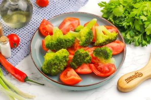 Карп, тушенный с овощами