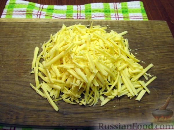 Запечённые кабачки с фаршем, морковью и сыром