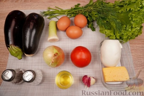 Баклажаны, фаршированные помидорами, яйцами и брынзой