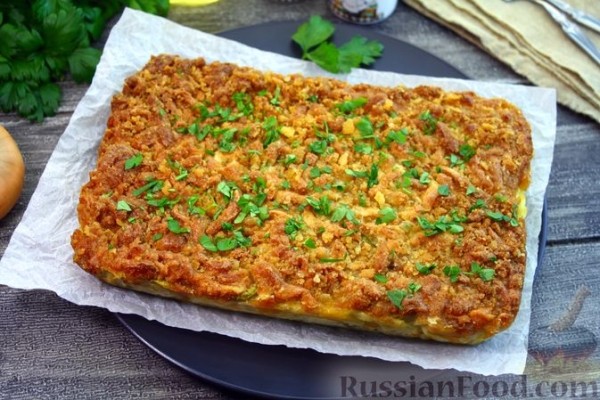 Кабачки, запечённые с сыром, сметаной и яйцами, под сухарной корочкой