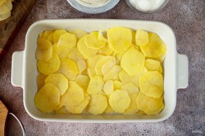 Рыба с картофелем, запеченные под майонезом