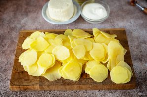 Рыба с картофелем, запеченные под майонезом